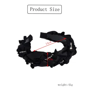 Black wide rhinestone headband with ruffles, fashionable and elegant hair accessory.