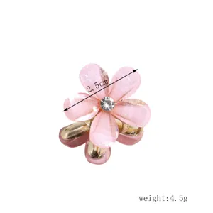 Mini pink flower hair claw clip with crystal center and 2.5cm size for cute side bangs.