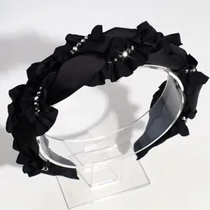 Black ruffled rhinestone headband detail, wide design with sparkling crystal accents.