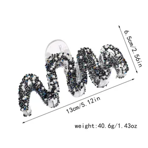 Shiny rhinestone pearl wavy hair claw clip detail view, sparkling crystal design for daily wear.