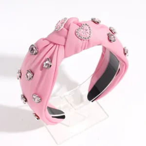 Serre-tête noué rose avec strass en forme de cœur, accessoire de cheveux mignon et stylé.