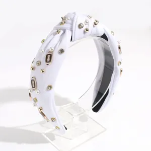 White knotted headband featuring elegant pearls, rhinestones, and sporty football charms.