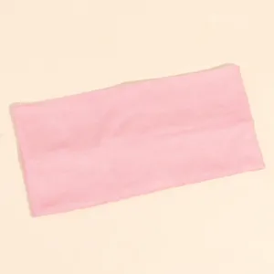 Fascia per capelli in maglia tinta unita fascia elastica sportiva dettaglio yoga e uso.