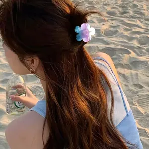 Gradient flower hair claw clip, elegant half-up hair accessory, sweet floral design for daily wear.