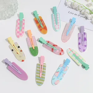 Cute summer fruit checkered hair clips close-up, sweet resin duckbill clip details view.