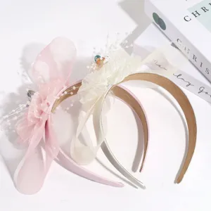 Elegantes Net Schleifen Haarband mit Perlen und Strass, ideal für Partys und Festlichkeiten.