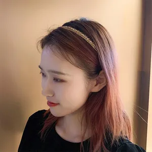 Detailed view of a Korean-style rhinestone thin headband, sparkling crystal hair hoop for women.