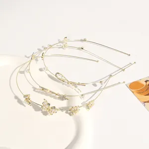 Delicate thin gold alloy hair hoops with pearls and rhinestones for daily styling.