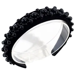 Diadema de terciopelo negro decorada con perlas negras brillantes para un estilo elegante y chic.