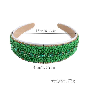 Green beaded detail of the stylish wide fashion headband with sparkling rhinestones.
