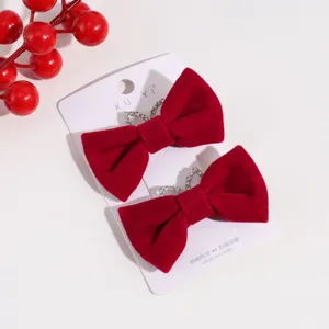 Red velvet bow hair clips with rhinestone decor, cute winter Christmas hair accessories set.