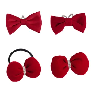 Red velvet hair bow clips with pearls and crown design, cute winter Christmas hair accessories.