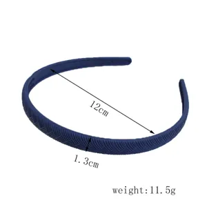 Cerchietto semplice in plastica con motivo strutturato, 12cm di diametro e 1.3cm di largo.