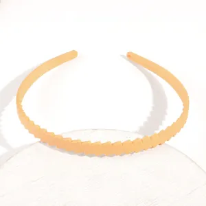 Cerchietto per capelli semplice in plastica tinta unita motivo obliquo moda