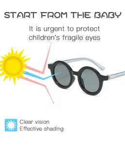 Gafas de sol redondas vintage para niños y bebés, elegante protección UV para los más peques.