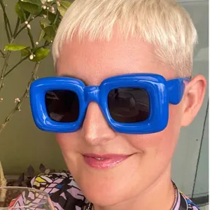Trendy chunky blue square sunglasses for women, oversized bubble frame street style shades.