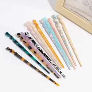 Elegant acetate hair sticks set, featuring twisted design and various chic patterns for daily styling.