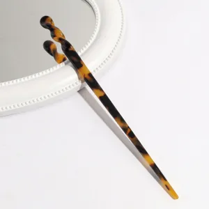 Acetate hair pin detail view showing vintage leopard print elegant hair accessory design.