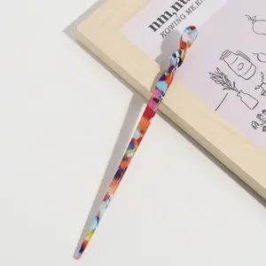 Colorful acetate hair stick with elegant mottled floral design for stylish daily hair styling.