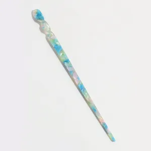 Blue green pink floral acetate hair stick detail view, elegant twisted design hairpin ornament.