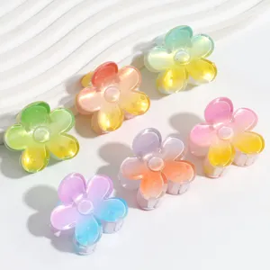 Gradient flower hair claw detail view, colorful resin mini hair clips for versatile styling.