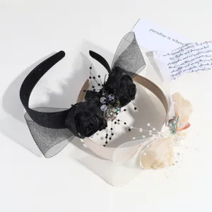 Detailed view of elegant European palace style mesh veil flower headbands, chic party hair accessories.