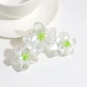 Molla per capelli floreale sfumata perlata, dettaglio accessorio tre fiori brillanti.