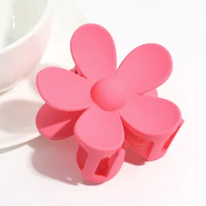Cute pink matte flower hair claw clip for women, sweet hair accessories for daily wear.
