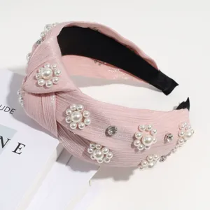 Diadema perlas rosa nudo estilo vintage accesorio cabello mujer elegante detalle