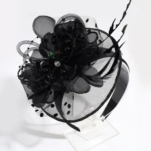 Black mesh feather fascinator headband detail view, elegant court style party hair accessory.