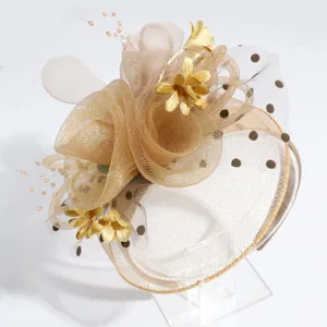 Elegant wedding banquet hair hoop detailed view showing gold mesh flowers and pearl accents.