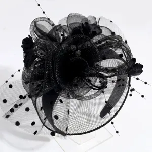 Black mesh fascinator headband detail, elegant party hair accessory with floral mesh feathers.
