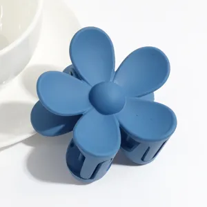Matte blue flower hair claw clip, cute macaron style hair accessory for daily styling.