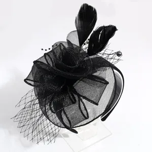 Close-up details of black feather mesh fascinator headband, elegant party hair accessory.