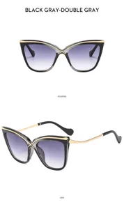 Gafas de sol de ojo de gato para mujer con lentes degradadas y montura metálica elegante.