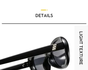 Close up view of vintage black sunglasses showing detailed frame and sleek metal temples.