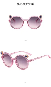 Cute rhinestone kids round sunglasses, pink glitter frame with gradient lenses, detail.