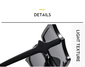 Black bat shape sunglasses temple detail close up, modern edgy fashion eyewear design.