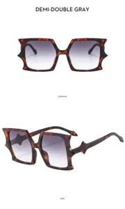 Trendy bat shaped sunglasses with gradient gray lenses and tortoiseshell frame for women.