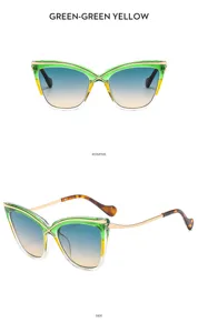 Gafas de sol de ojo de gato elegantes para mujer con lentes degradadas y patillas metálicas.