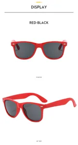Children neon classic party sunglasses detail view, red plastic frame, cool summer beach eyewear.