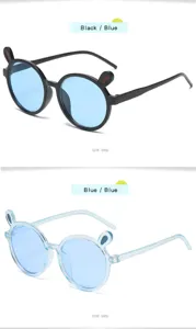 Cute kids round sunglasses with cartoon rabbit ears design, stylish eyewear for children.