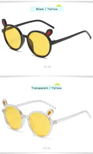 Cute cartoon rabbit ear round sunglasses detail view showing yellow lenses and clear frame.