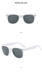 Details of white frame kids sunglasses showing stylish temple design and dark lenses closeup.