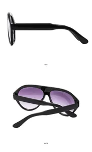 Vista detallada de gafas de sol Y2K negras de tendencia con lentes degradadas moradas.