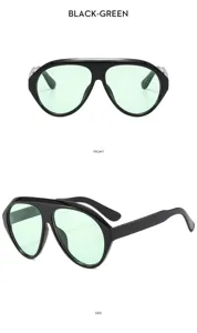 Vista detallada de gafas de sol Y2K de moda con montura negra gruesa y lentes tintadas verdes.