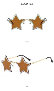 Fashion star-shaped rimless rhinestone sunglasses with gold frames and brown lenses for party.