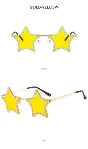 Fashion rimless rhinestone star sunglasses with yellow lenses for party and festival wear.