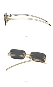 Gafas de sol Y2K sin montura elegantes con varillas doradas y detalles punk de estrellas.