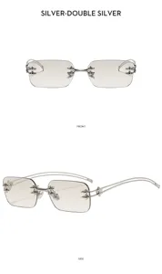 Gafas de sol sin montura Y2K con bisagras de estrella de metal plateado y lentes degradadas.